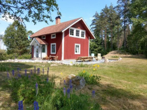 Sandbacken cottage in the forest